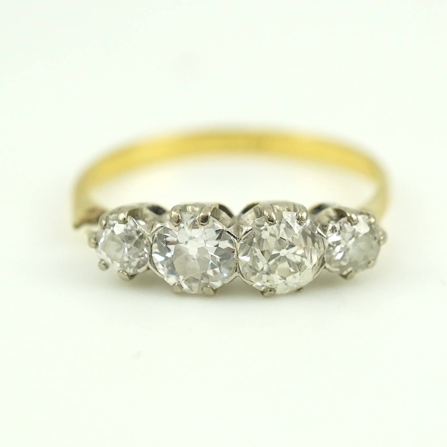 A four-stone diamond ring, early 20th century